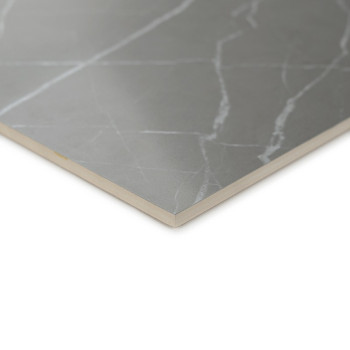 A square, light gray ceramic tile with subtle white streaks sits on a white background, showcasing a marble-like texture.