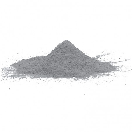 Gray powder pile resting on a white surface, creating a loose, conical shape in an uncluttered environment.