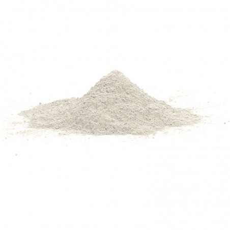 Un montículo de polvo fino y blanco descansa sobre una superficie lisa y neutra, lo que sugiere potencial para mezclar o aplicar