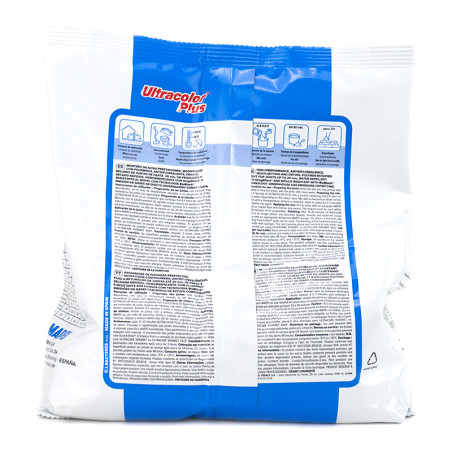 Een witte en blauwe plastic zak met het opschrift `Ultracolor Plus` toont gedetailleerde gebruiksinstructies in meerdere talen.