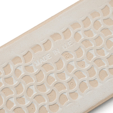A beige rubber sole features a raised, interlocking geometric pattern with the text `MADE IN U.S.A.` embossed at the center.