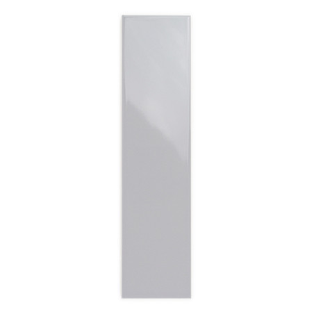 A glossy, rectangular tile stands vertically, reflecting light subtly, placed against a plain, white background.