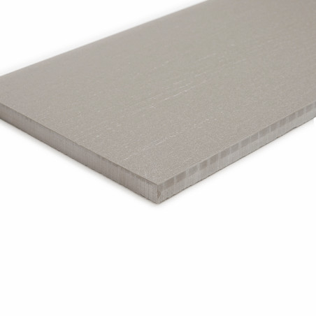A rectangular, smooth, gray tile rests on a plain white background, highlighting its uniform texture and straight edges.