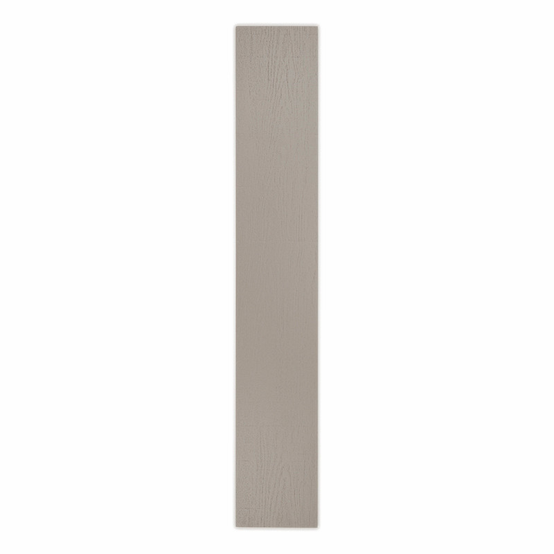 Un azulejo cerámico rectangular de color gris claro se encuentra verticalmente y muestra una superficie lisa y ligeramente textu