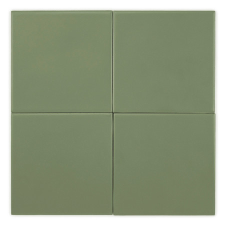 Cuatro azulejos cuadrados, mate, de color verde oliva, están alineados simétricamente, formando un patrón de cuadrícula. Los azu