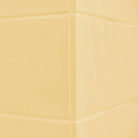 Los azulejos de cerámica amarillos forman una esquina en ángulo recto, creando una superficie elegante y minimalista con una ilu Los azulejos de cerámica amarillos forman una esquina en ángulo recto, creando una superficie elegante y minimalista con una ilu
