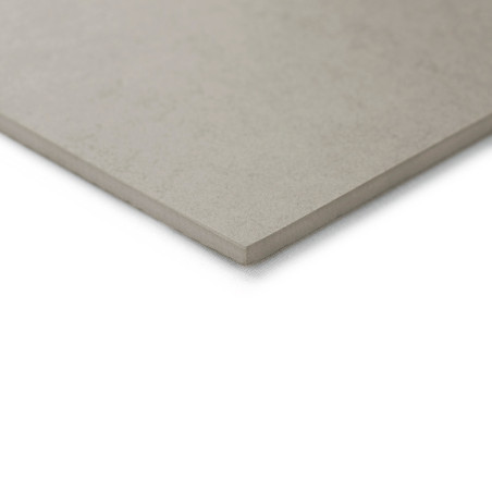 A close-up of a square, light gray ceramic tile with a smooth, matte finish, positioned on a white background.