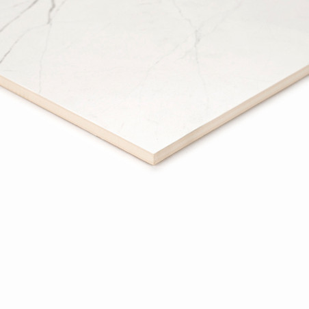 Square ceramic tile displays thin, subtle gray veins resembling marble. edges are straight and sharp, positioned against a light