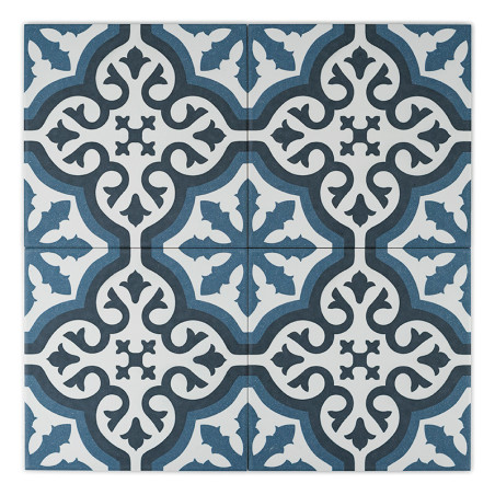 Un carreau présente un motif floral orné dans des teintes noires et bleues. des motifs symétriques se connectent sur quatre carr Un carreau présente un motif floral orné dans des teintes noires et bleues. des motifs symétriques se connectent sur quatre carr