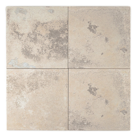 Quatre carreaux carrés présentent un motif marbré beige et gris, formant une grille symétrique. La texture ressemble à la pierre