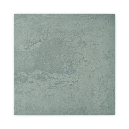 A square tile displays a mottled, textured surface in muted green tones, reminiscent of natural stone, set against a plain, whit