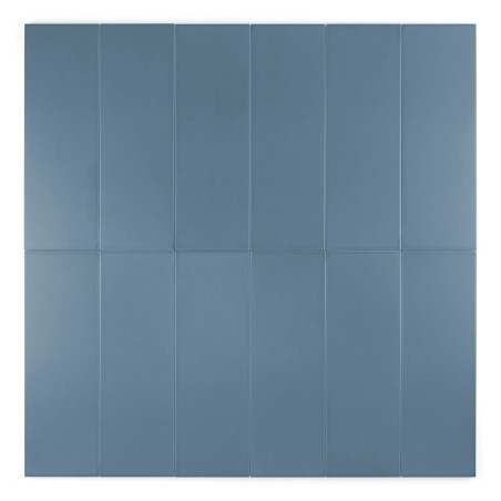 Doce azulejos rectangulares de color gris azulado están dispuestos en una cuadrícula de 4x3, creando un patrón uniforme y sin co