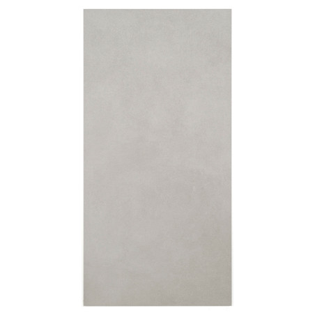 Un azulejo gris liso y rectangular está centrado, apoyado sobre un fondo blanco liso, creando una apariencia minimalista y limpi