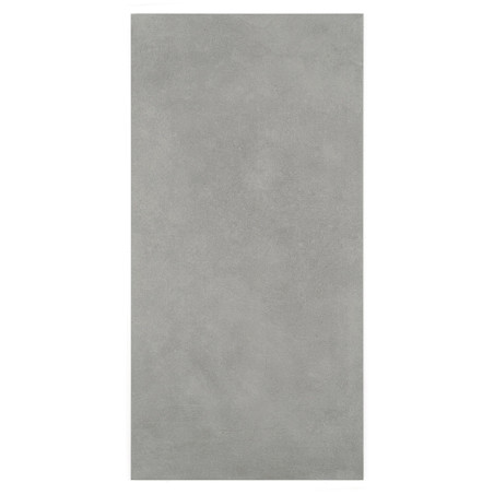 Azulejo rectangular de hormigón liso con acabado gris claro, colocada en posición plana, lo que sugiere su uso en suelos o reves