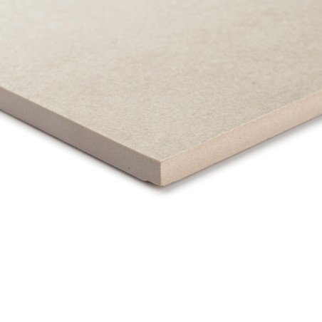 Un carreau de céramique beige repose à plat, mettant en valeur sa surface lisse et ses bords nets et définis, évoquant un revête Un carreau de céramique beige repose à plat, mettant en valeur sa surface lisse et ses bords nets et définis, évoquant un revête