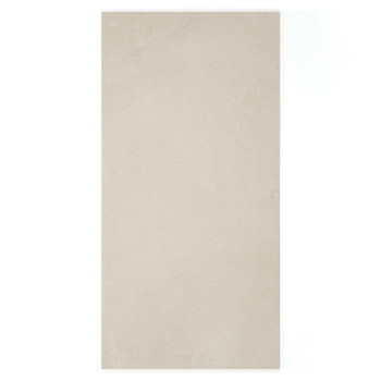 Un carreau rectangulaire beige repose à plat, présentant une surface lisse et uniforme. Il est placé sur un fond blanc uni.