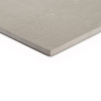 A beige, square tile rests flat with its smooth surface exposed, edges slightly beveled, against a white background. No text is 
