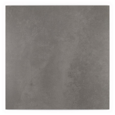 Le carreau carré gris, lisse et légèrement texturé, repose sur un fond blanc uni, suggérant un décor de design moderne et minima