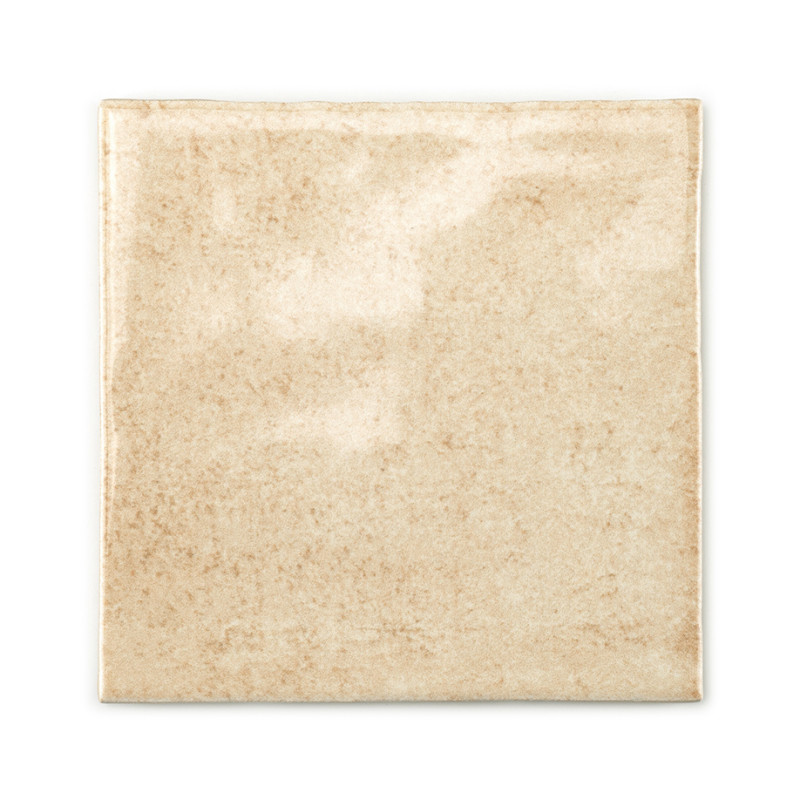 A square, beige ceramic tile with a slightly glossy surface sits against a white background, appearing smooth and uniform.