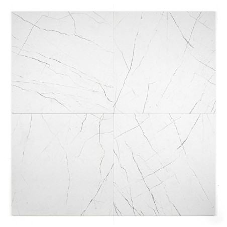 Quatre carreaux de marbre blanc présentant de fines veines grises irrégulières se croisant à différents angles, créant un motif 