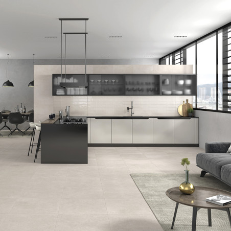 Cuisine moderne avec armoires épurées et décor minimaliste, comprenant un îlot central contenant une cuisinière au gaz et un évi Cuisine moderne avec armoires épurées et décor minimaliste, comprenant un îlot central contenant une cuisinière au gaz et un évi