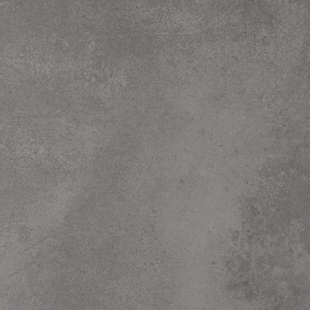 Een getextureerde, matgrijze tegel vertoont subtiele spikkels en gradiënten, die op beton lijken. het bootst een industriële omg