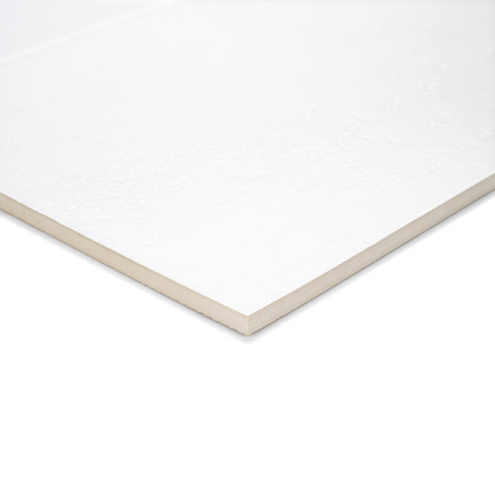 Carreau rectangulaire blanc à surface légèrement texturée, posé à plat. Ses bords lisses et ses coins nets suggèrent un état neu
