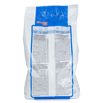 Le sac affiche des instructions détaillées et des illustrations sur sa surface blanche et bleue. Texte : « Ultracolor Plus ».