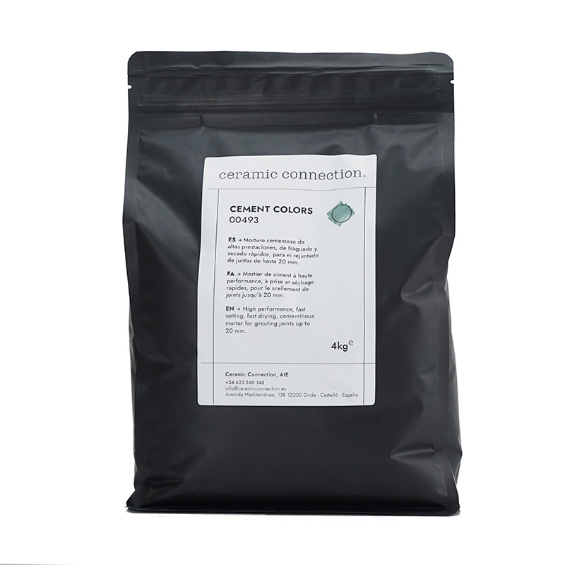 L'emballage noir contient de la poudre de résine-ciment, étiquetée « connexion céramique ». COULEURS CIMENT 00493, 4kg, pour app