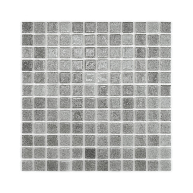 Square glass mosaic tiles, arranged uniformly, display subtle gradients of gray, creating a textured pattern against a white bac