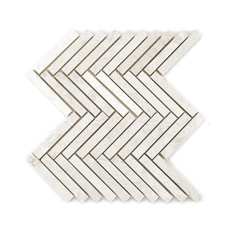 Les carreaux de pierre blanche forment un motif à chevrons, créant un effet zigzag sur un fond simple et épuré.