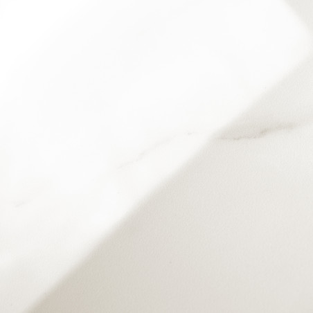 A smooth white marble tile with subtle gray veining diagonally extends across a flat, well-lit surface, giving an impression of 