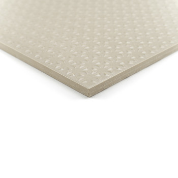 A square beige tile rests on a white background, displaying a raised geometric pattern across its smooth surface.