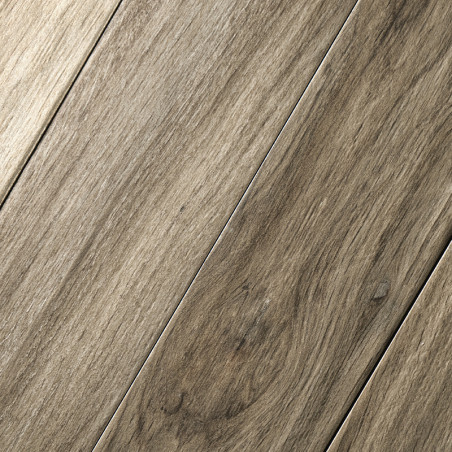 Wooden planks lie diagonally, displaying a textured, grainy surface. The tone is a medium brown, resembling rustic or natural wo