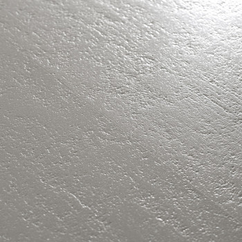 Eine glatte, matte Keramikfliese mit einer dezenten, strukturierten Oberfläche, die an sanfte Wellen erinnert. Licht wird sanft 