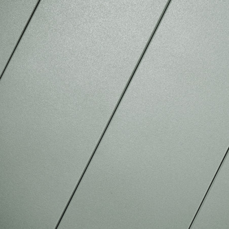 Gray rectangular tiles lie diagonally, forming a uniform pattern across a flat surface, with subtle shadows between each tile.