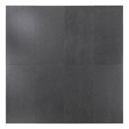 The image shows eight matte black tiles arranged in a rectangular grid, forming a seamless pattern, set against a plain white ba