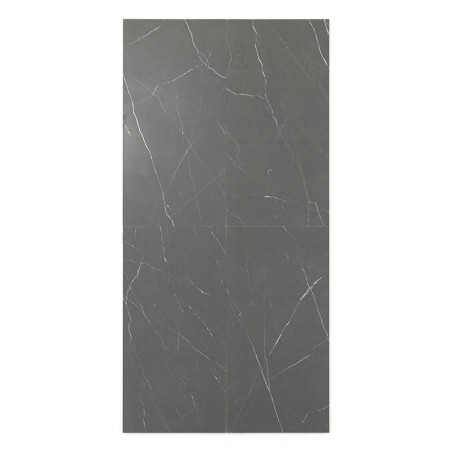 A large, rectangular tile with a dark gray surface features thin, white veining, resembling marble, set against a plain backdrop
