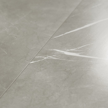 Gray marble tile exhibits subtle white veining, creating a sleek pattern across a smooth surface. positioned in an indoor settin