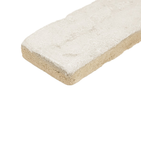 Rectangular terracotta tile sits stationary, showcasing a textured cream surface with rough edges. isolated on a white backgroun Rectangular terracotta tile sits stationary, showcasing a textured cream surface with rough edges. isolated on a white backgroun