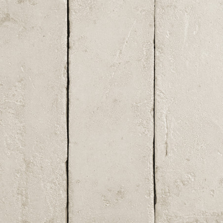 Rectangular terracotta tiles lie in a row, featuring a rough texture and light beige color, creating a rustic aesthetic. Rectangular terracotta tiles lie in a row, featuring a rough texture and light beige color, creating a rustic aesthetic.