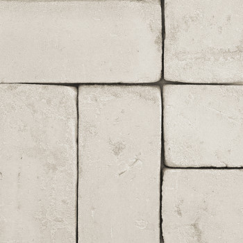Rectangular terracotta tiles lie flat, forming an interlocking pattern. Surrounding them, a smooth, neutral-toned grout binds th