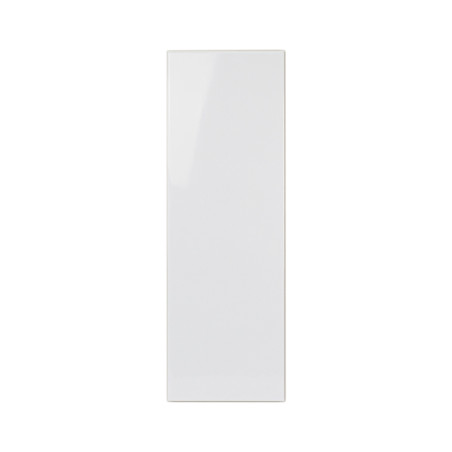 Un carreau rectangulaire blanc brillant reflète la lumière, placé sur un fond uni, suggérant un design épuré et moderne pour les