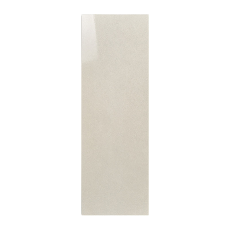 Beige rectangular tile lies flat, reflecting light subtly on a smooth, glossy surface within a plain, white background.