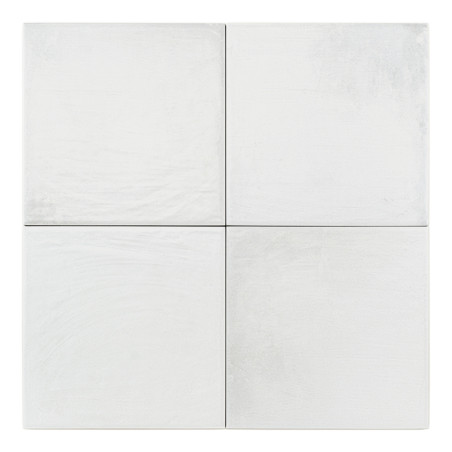 Four white square tiles are aligned in a two-by-two grid pattern with subtle texture, creating a clean, minimalist appearance.