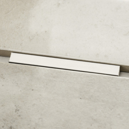 Un carreau rectangulaire beige est aligné avec un autre, créant une jonction harmonieuse. Les carreaux ont une texture lisse sem Un carreau rectangulaire beige est aligné avec un autre, créant une jonction harmonieuse. Les carreaux ont une texture lisse sem