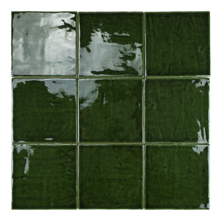 Nine glossy, dark green ceramic tiles with uneven reflections are arranged in a three-by-three grid, set against a plain white b