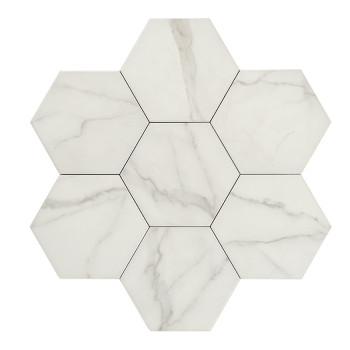 Carreau de marbre hexagonal aux veines grises douces, reposant sur un fond blanc, évoquant une esthétique épurée et moderne.