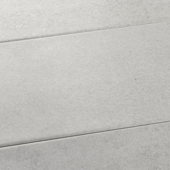 Los azulejos grises rectangulares se encuentran planas y muestran una textura sutil y moteada. Es parte de un diseño de superfic
